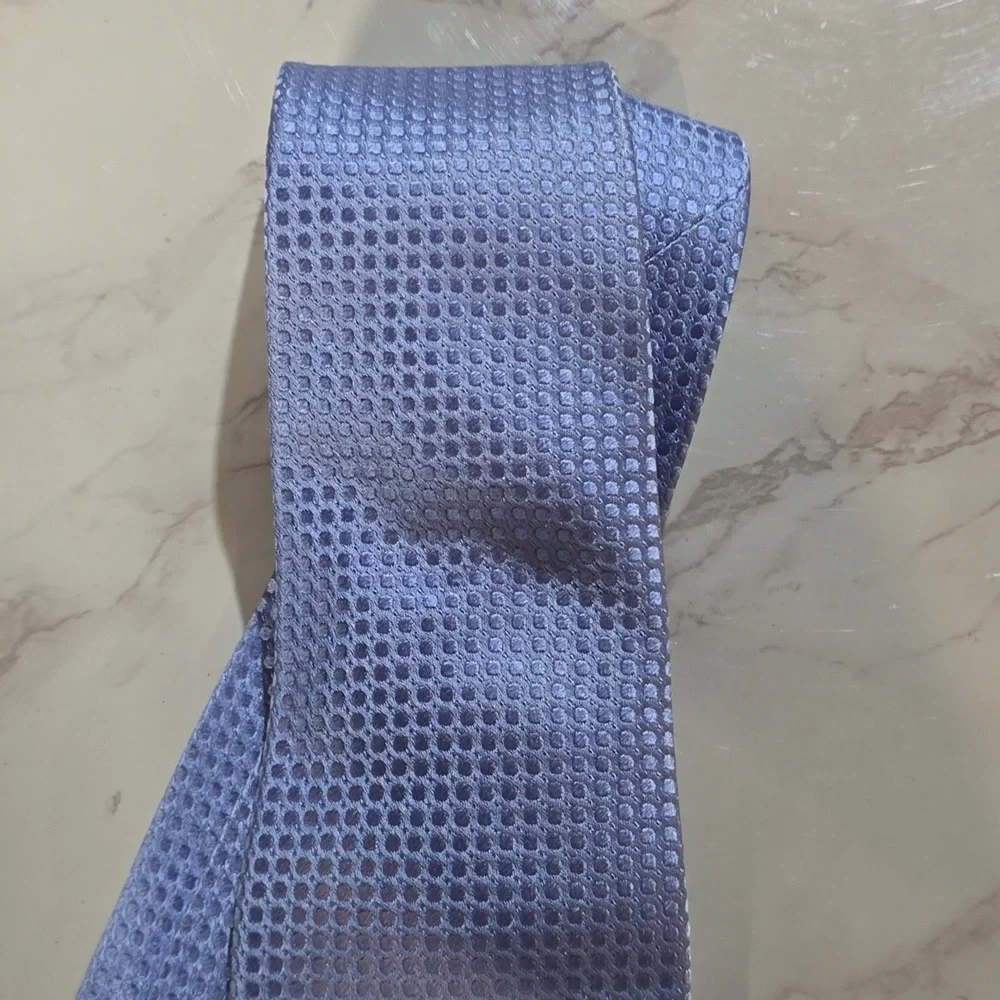 Sophisticated Light Blue Textured Tie By Donald Trump